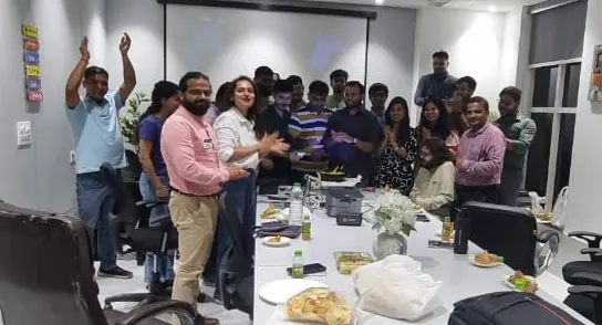 Toastmasters members celebrating success, awards, achievements.