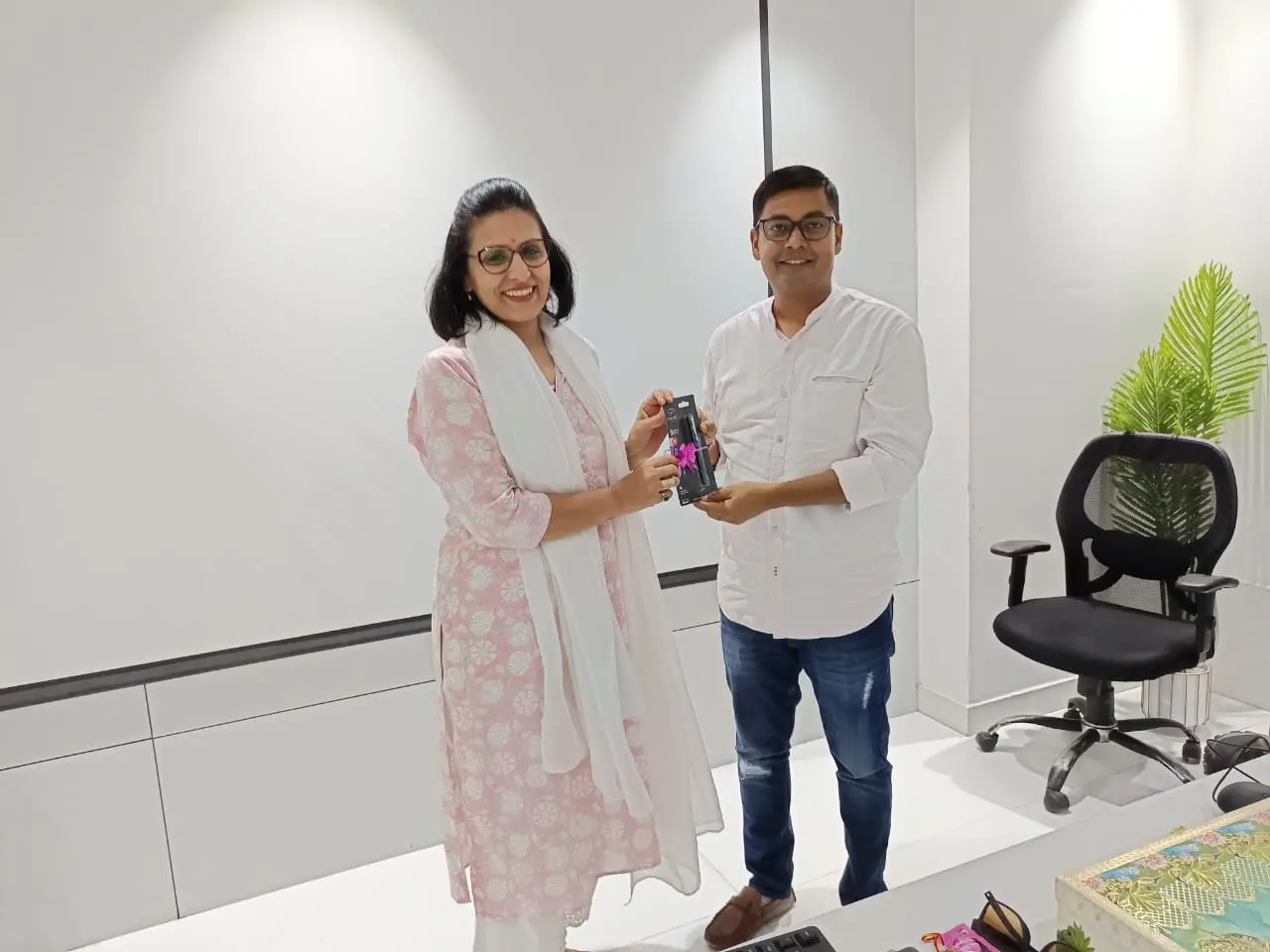 Toastmasters member receiving award, public speaking achievement.