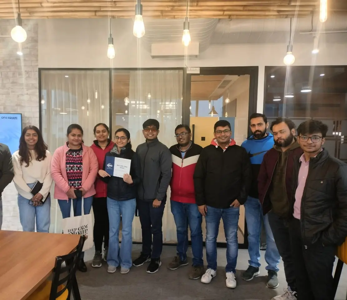 Members posing together after a Toastmasters session