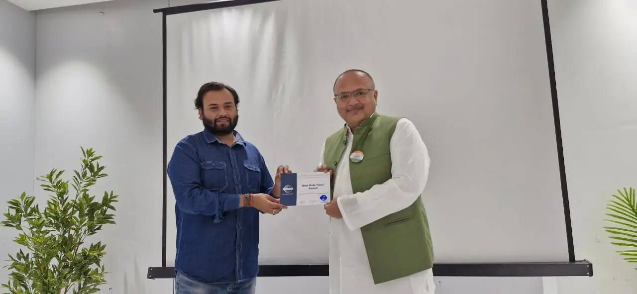 Toastmasters member receiving award, public speaking achievement.
