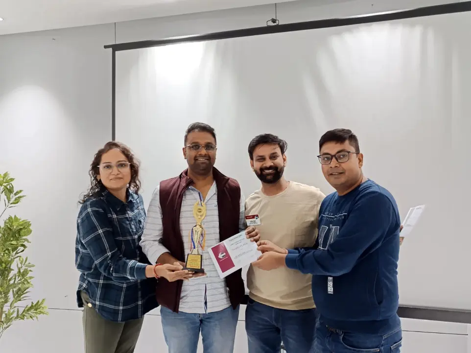 Toastmasters member receiving award, public speaking achievement.
