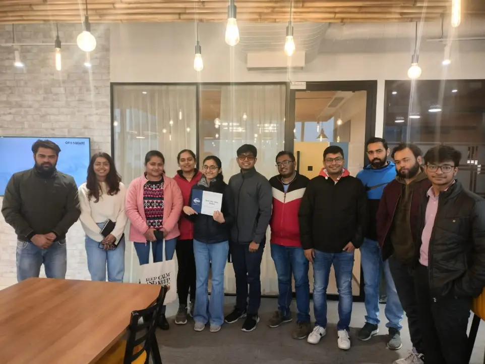 Members posing together after a Toastmasters session